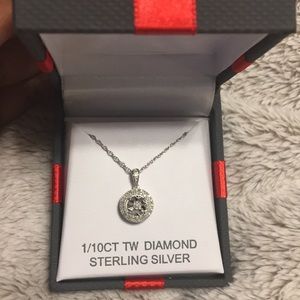 Sterling silver necklace with a diamond.
